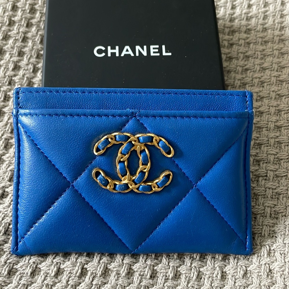 Chanel 19 leather card holder 
Very good condition. Lightly used. 
Blue, Leather
